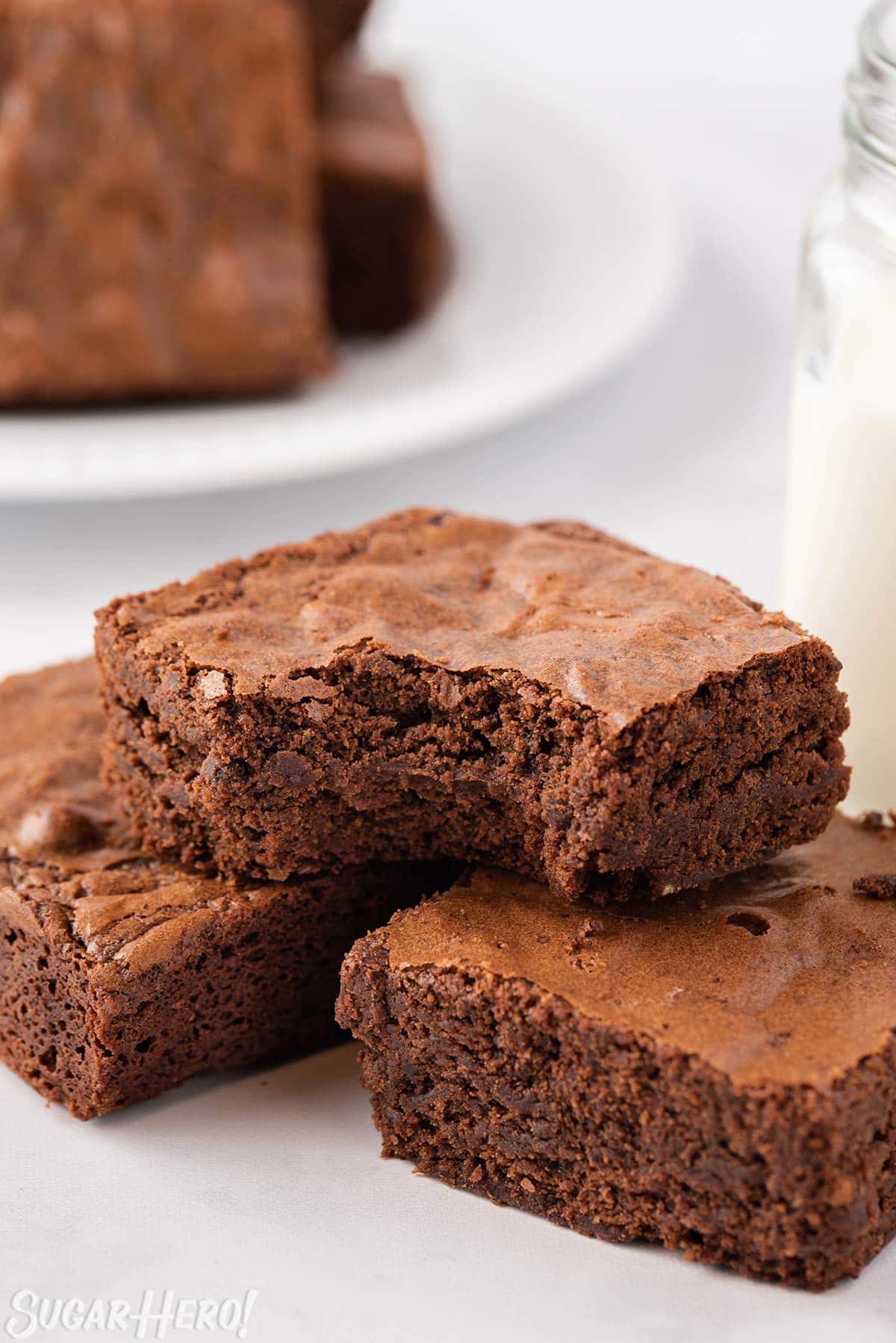 Brown Butter Brownies with a bite taken out of the top one