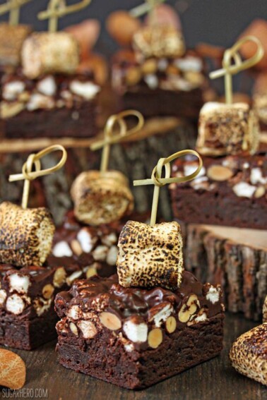 Close up of cut Campfire Rocky Road Brownies that are embellished with a toasted marshmallow.