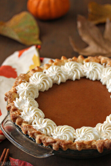 Dulce de Leche Pumpkin PieDulce de Leche Pumpkin Pie surrounded by fall leaves and cinnamon sticks.