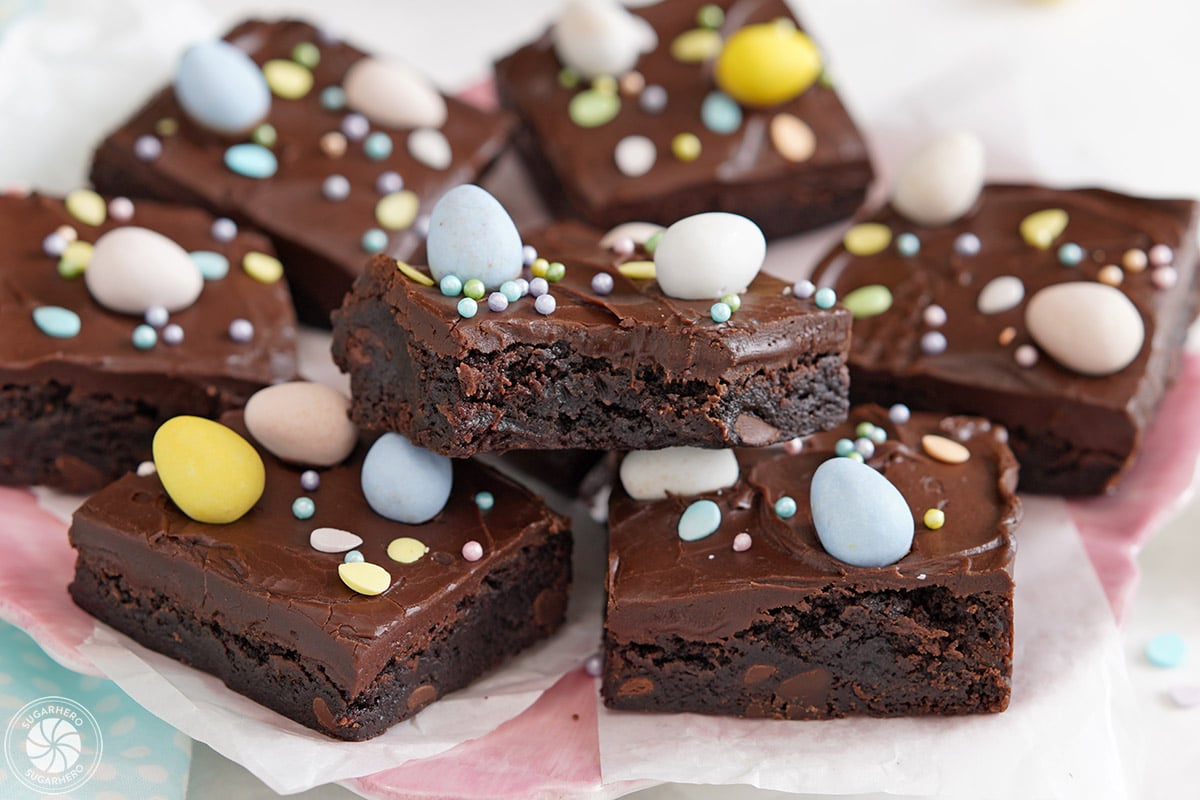 Close-up of an Easter Egg Brownie with Cadbury mini eggs on top and a bite taken out of it.