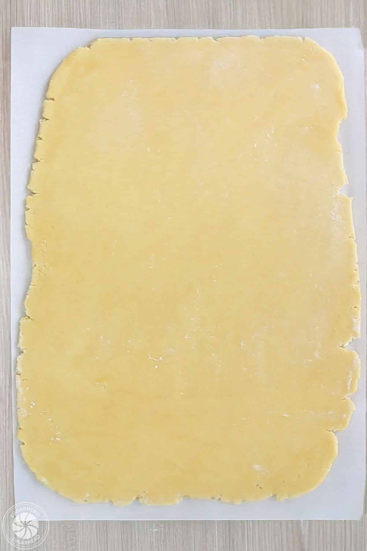 Sugar cookie dough rolled into a rectangle.