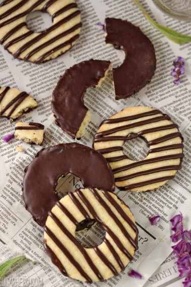 Fudge-Striped Shortbread Cookies on a piece of newspaper.