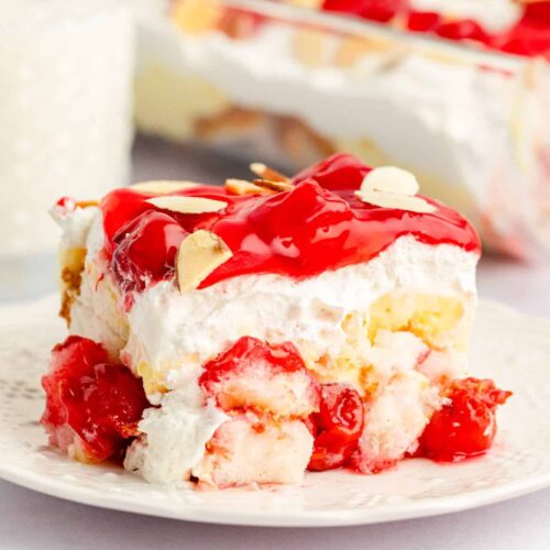 Slice of Heaven On Earth Cake on a small white plate.