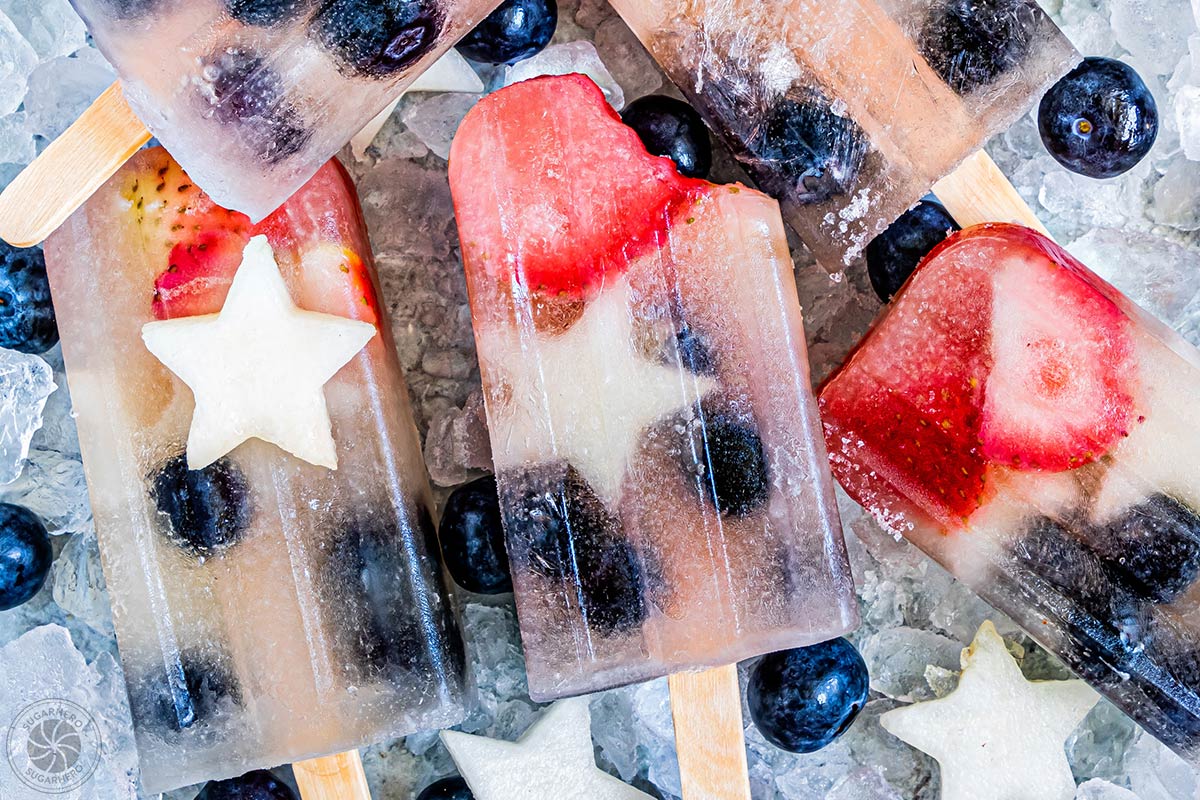 Close-up of Homemade Fruit Popsicles with a bite taken out of one of them
