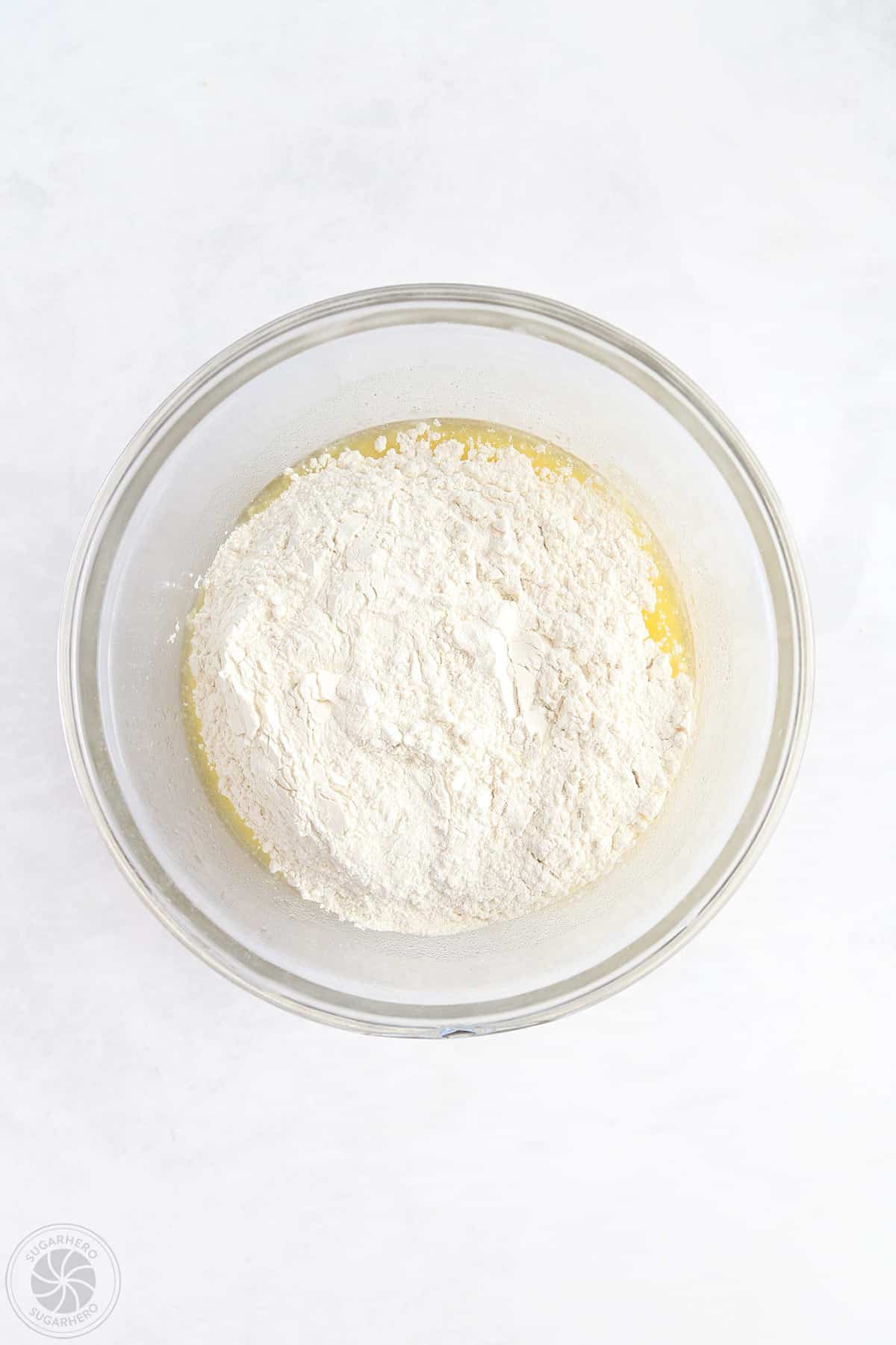 A mixing bowl with ingredients in it to make a crust for Lavender Lemon Bars.