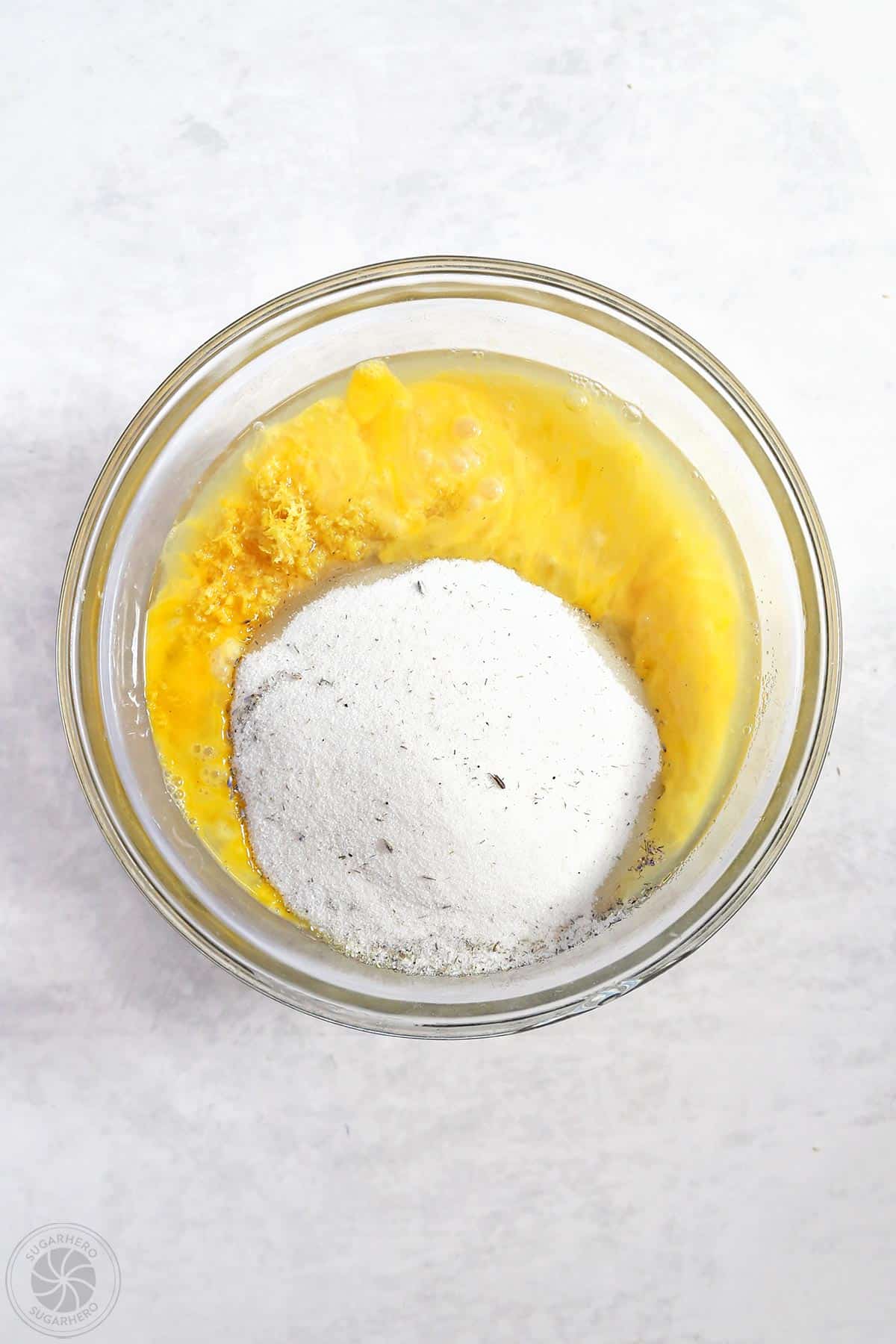 A mixing bowl filled with the ingredients to make the filling for Lavender Lemon Bars.