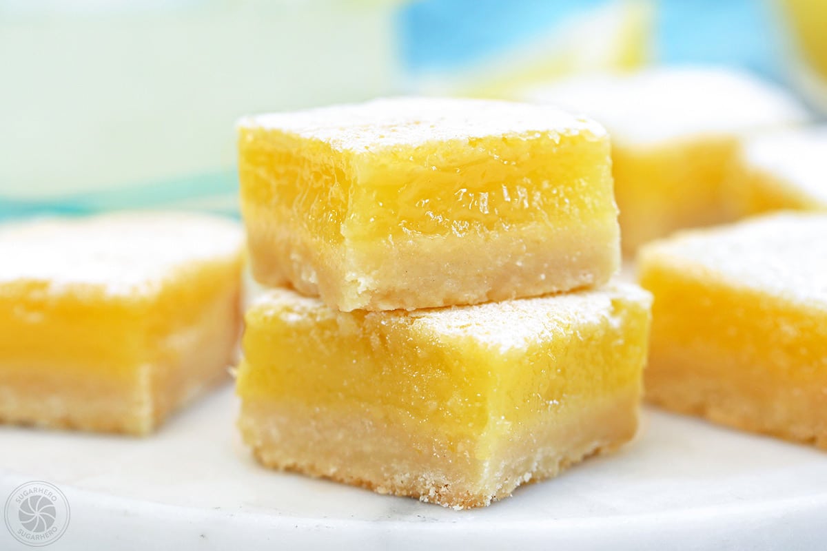 Two stacked lemon bars.