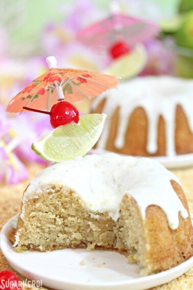 A Mai Tai Bundt Cake on a small plate with a portion cut away to show interior.