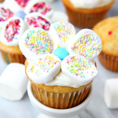 Close up of a Marshmallow Flower Cupcake for Easter Cupcake Round up.