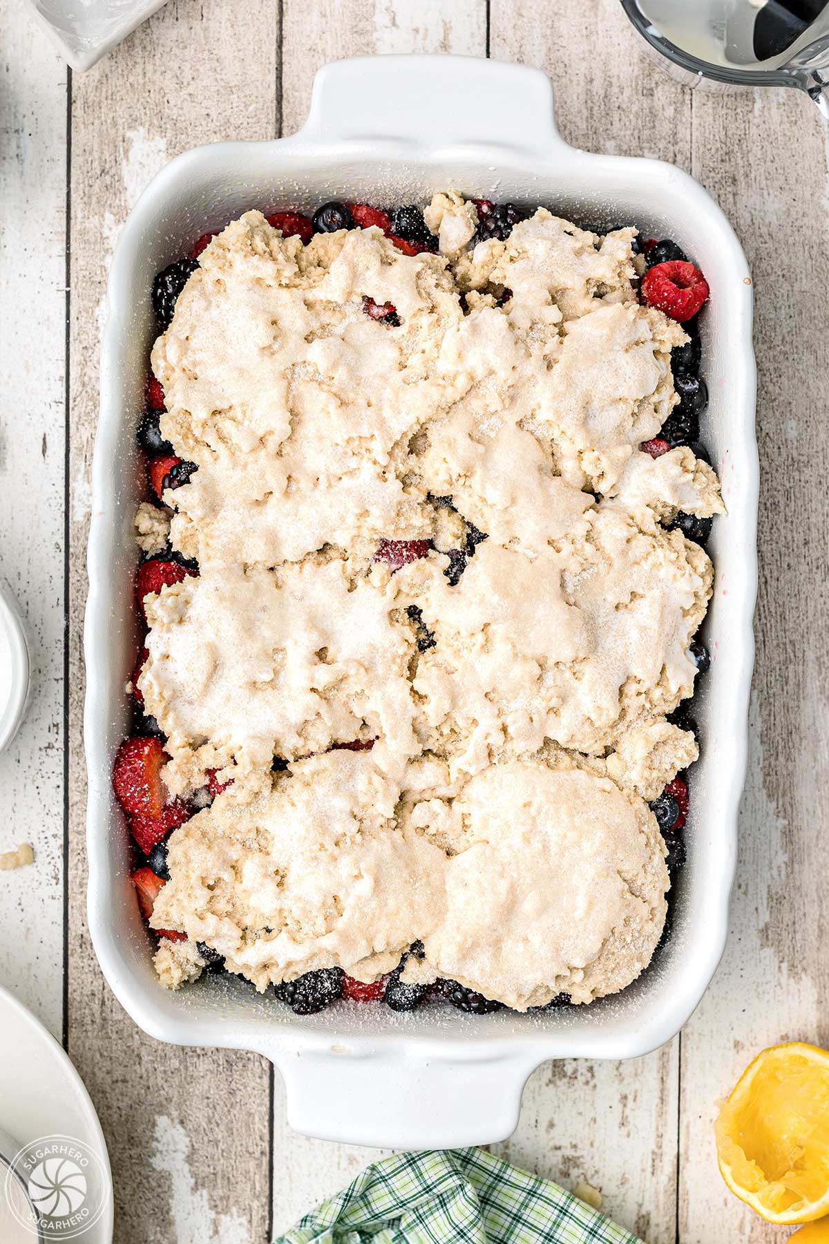 Top view of crust on top of unbaked cobbler.