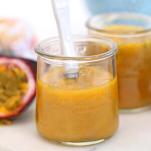 Close-up of a jar of passion fruit puree.