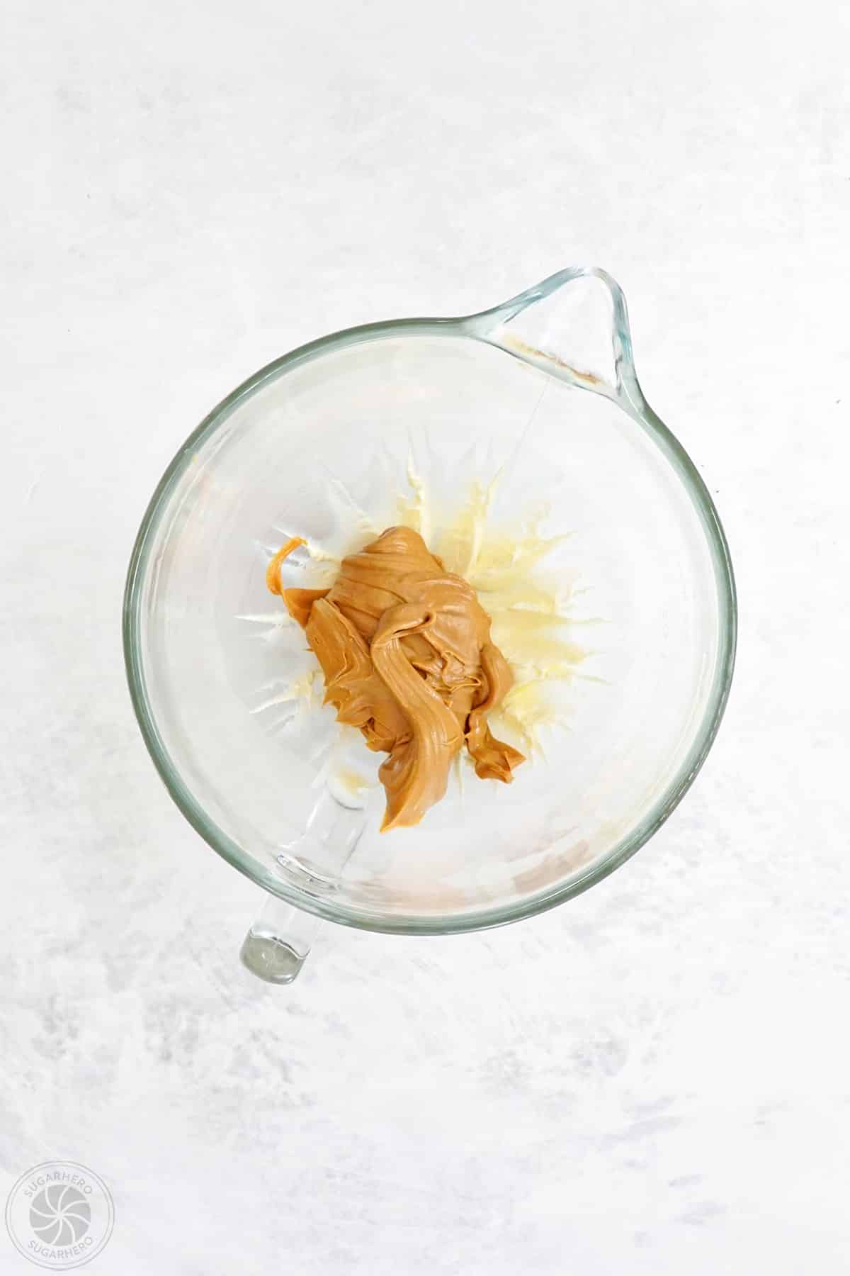 Creamed butter in a mixing bowl with added peanut butter.