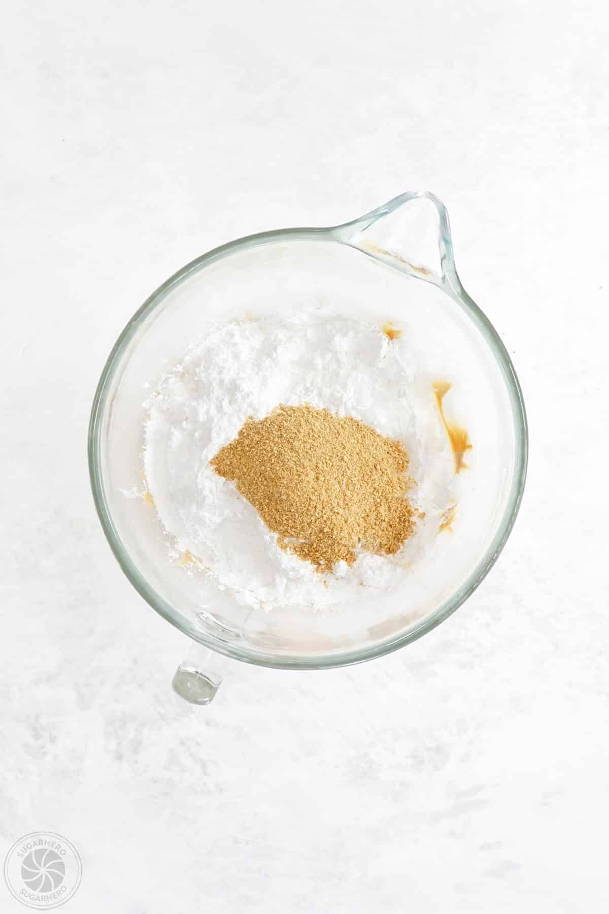 Powdered sugar and crushed graham crackers added to a peanut butter filling mixture.