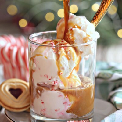Coffee being poured over peppermint ice cream.