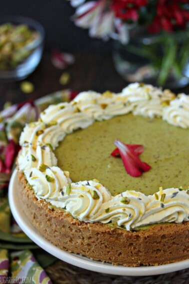 Pistachio Pie with Lemon Whipped Cream on a white cake platter.