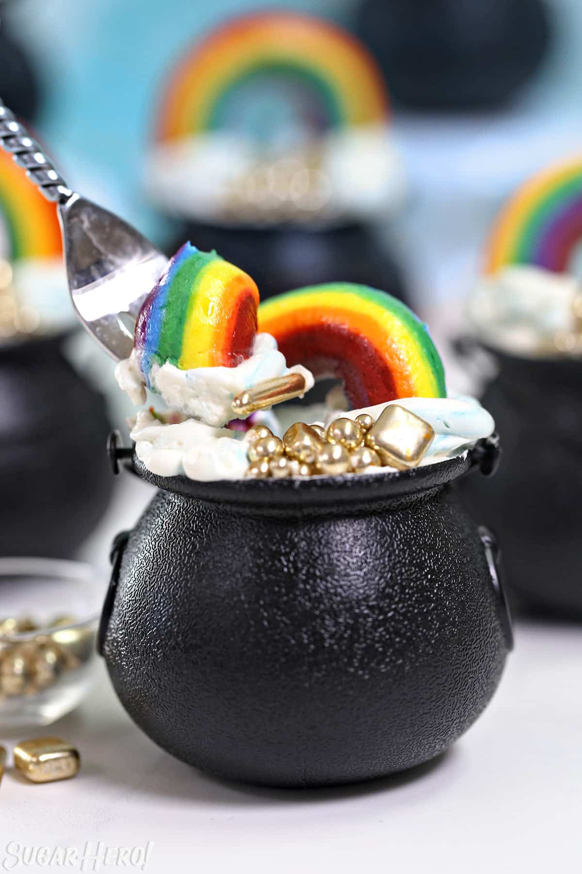 Fork taking a bite out of a Pot of Gold Cupcake.