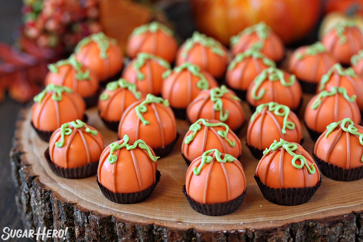 Group of Pumpkin Bread Truffles decorated to look like mini pumpkins