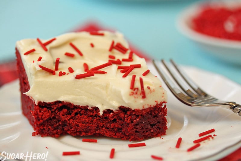Red Velvet Bars - A single Red Velvet bar with a bite taken out. | From SugarHero.com 