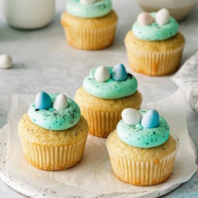 3 Robin's Egg Easter Cupcakes on a piece of white tissue for Easter Cupcake Round up.