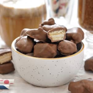 Homemade Root Beer Float Pieces in a white bowl, with one cut open to show the inside.