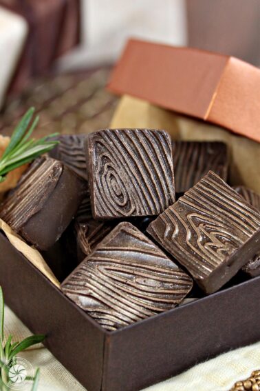 A box of Rosemary Raspberry Truffles with a copper lid.