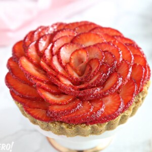 Close-up of a Strawberry Rose Tart with a pink napkin in the background.