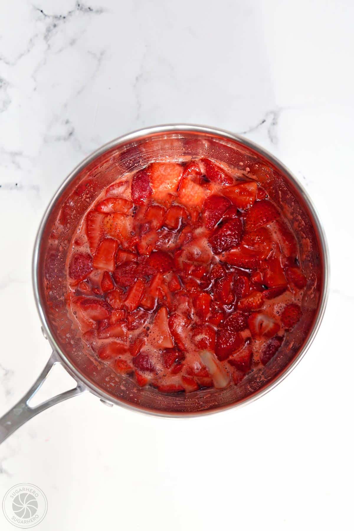 Strawberry sauce in a saucepan.
