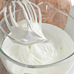 Thick, shiny, white egg whites and sugar for Swiss Meringue Buttercream.