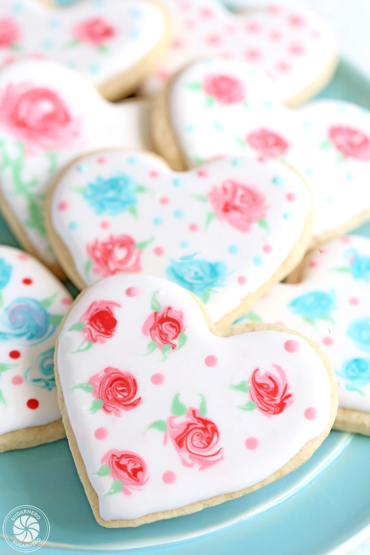 Close up of Valentine's Day Sugar Cookies with roses and polka dots.