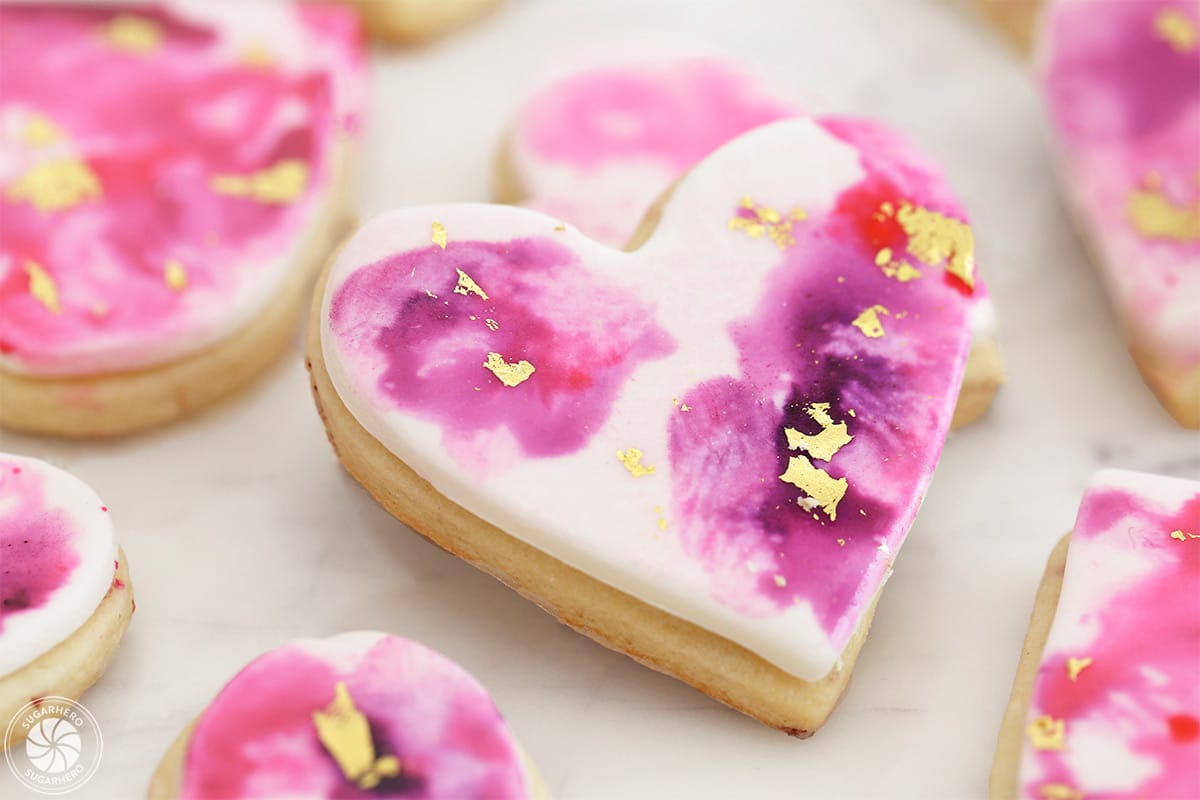 Close up of a Watercolor Rose Sugar Cookie.