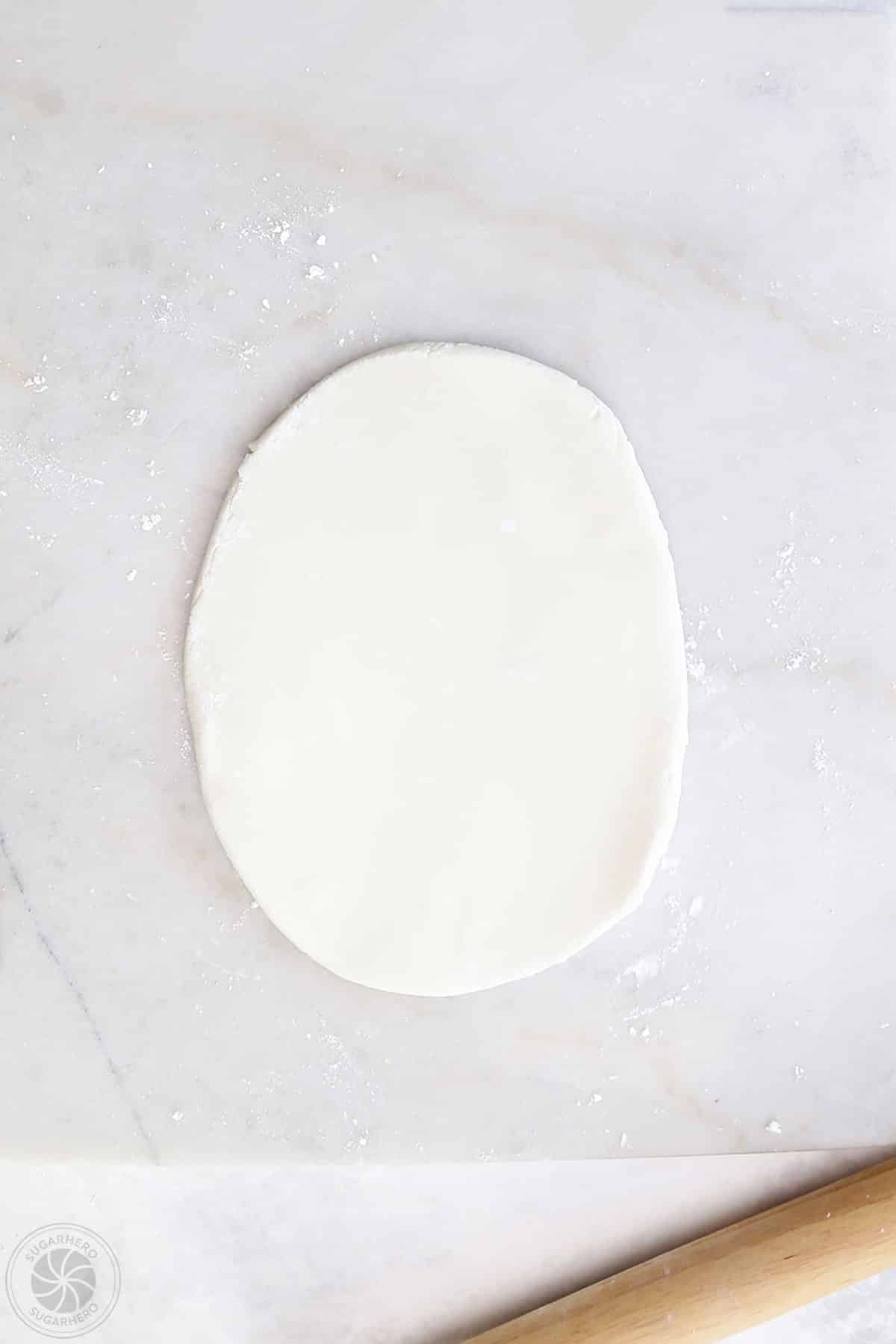 Rolled out white fondant.
