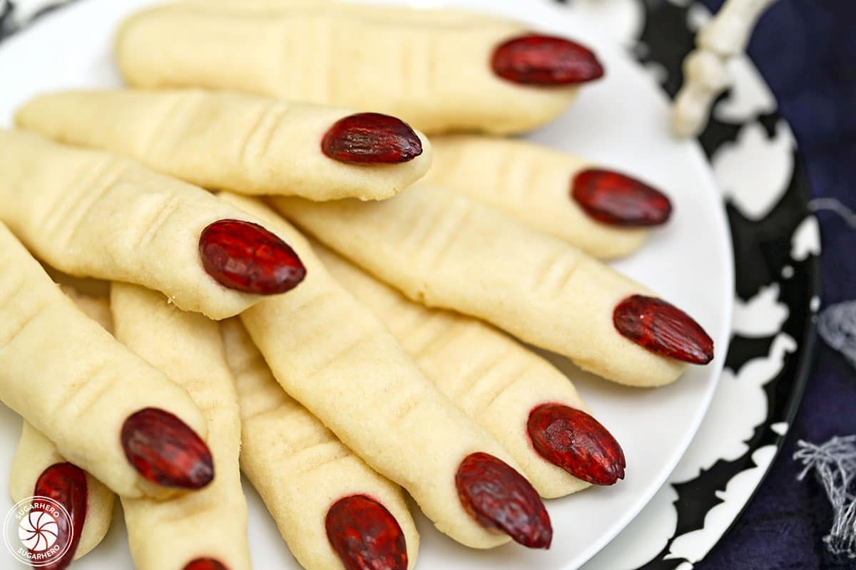 Close-up of Witch Finger Cookies with red almonds for finger nails.